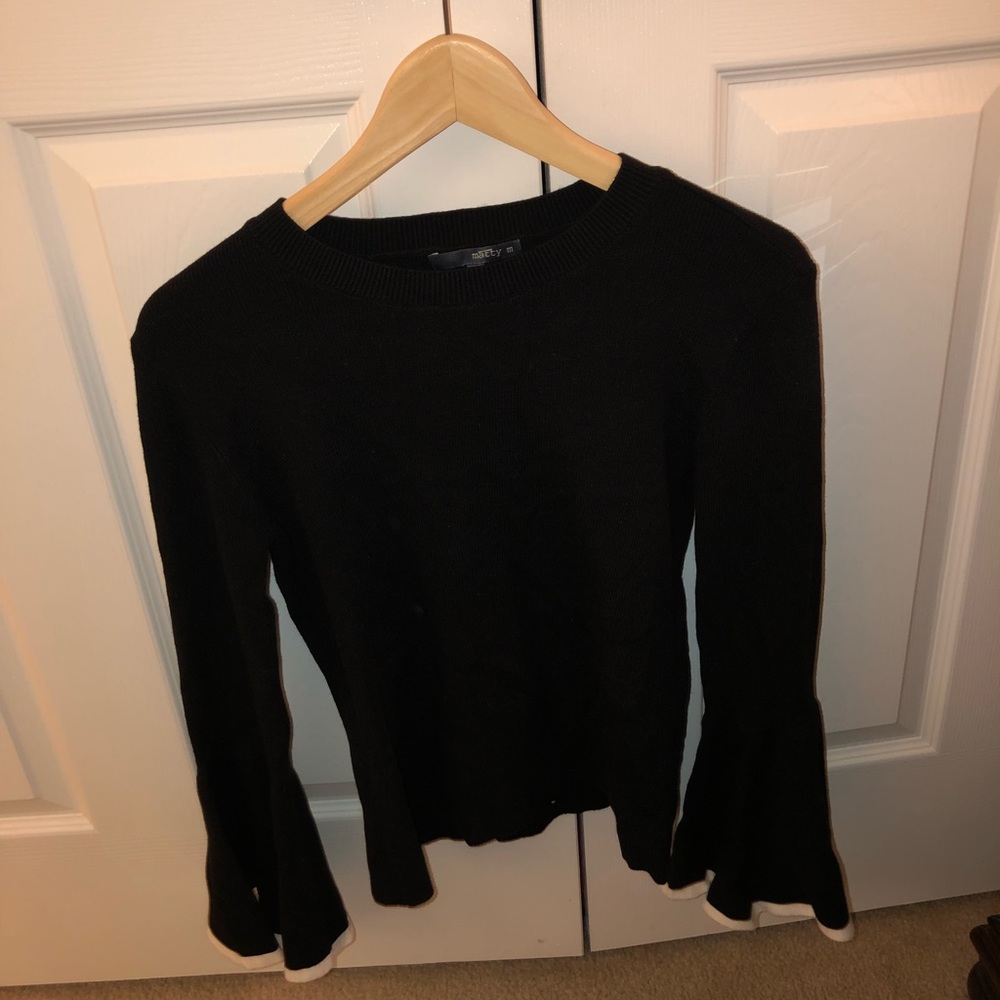 South moon under sweater